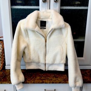 Urban outfitters faux fur off white bomber jacket. Size s